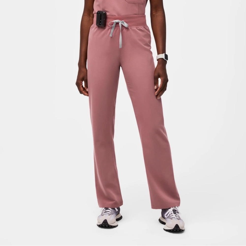 The set mauve pink but pants are flare super cute only worn once small regular